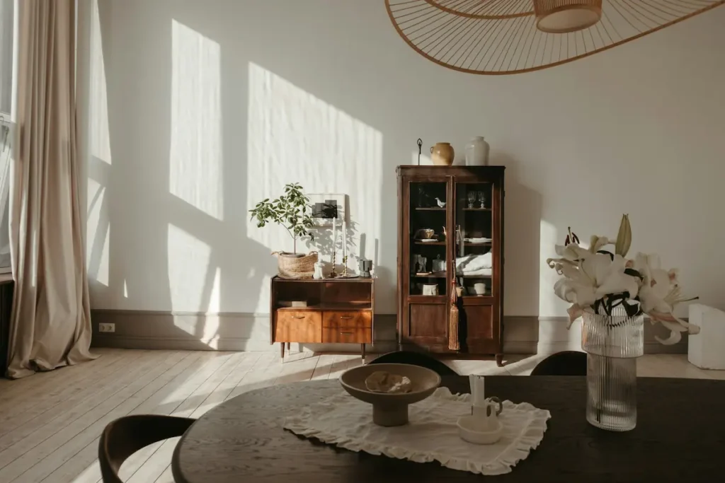 minimalist quiet luxury interior with neutral sofa and soft natural light